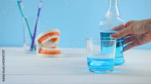 mouthwash on the table in a glass. Oral care