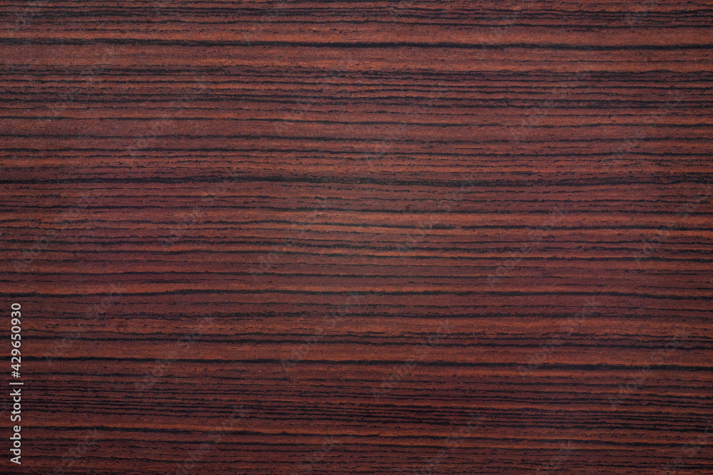 Photo of antique mahogany texture with black vertical stripes