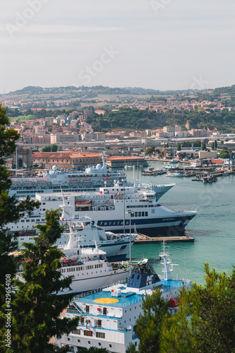 Aerial view of cruise ships and ferries docked at the port of Ancona. Bright summer day, travel concept