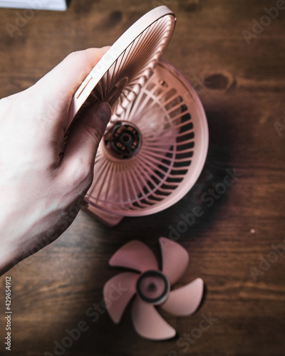 fixing the pink fan. disassembled