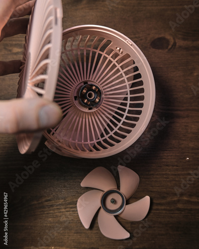 fixing the pink fan. disassembled