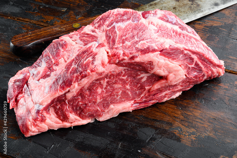 Raw fresh meat Ribeye steak entrecote of Black Angus Prime meat, on old dark  wooden table background