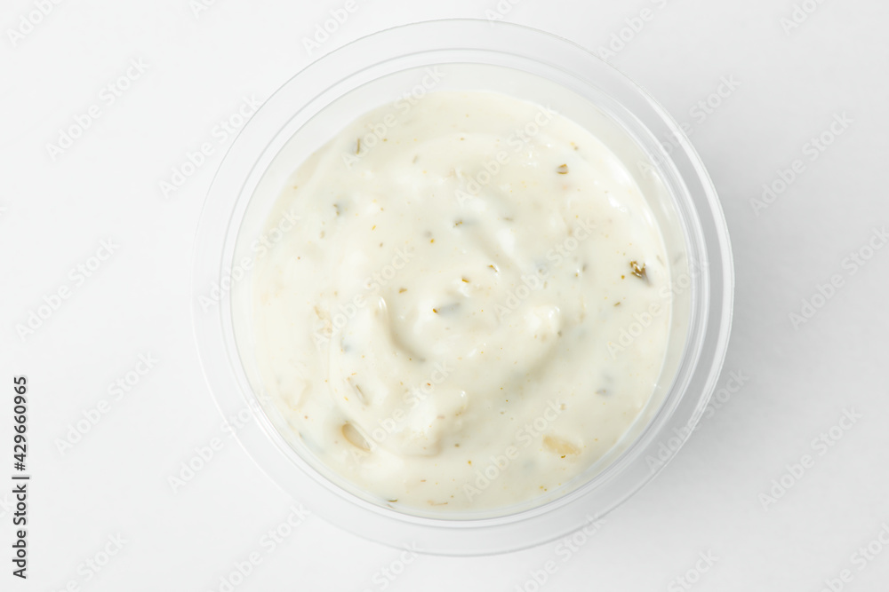 Small cup of tartar sauce, top view on white background Small cup of tartar sauce, top view on white background