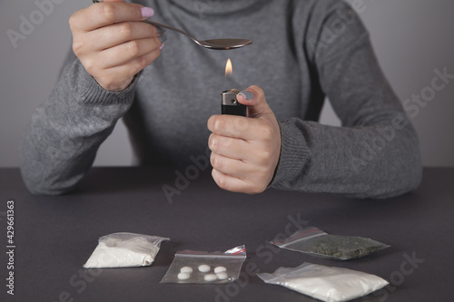 Wallpaper Mural Young woman  using drugs.The concept of crime and drug addiction. Torontodigital.ca