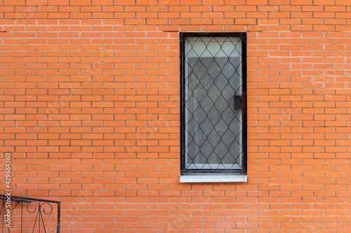 A window in a brick wall. Old building.