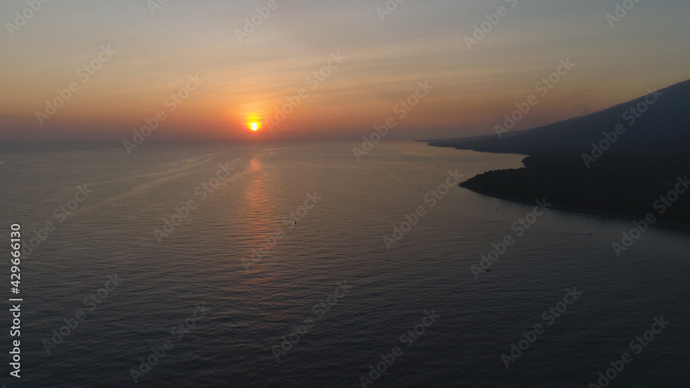 aerial view sunrise over ocean. seascape colorful sunrise over sea at tropical resort