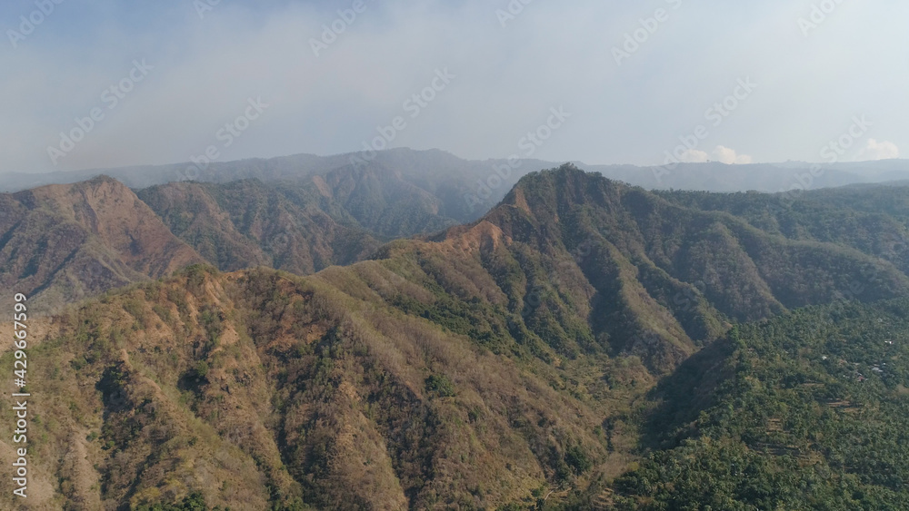 aerial view mountain landscape mountain range with high cliffs. Mountains covered with trees and vegetation. tropical landscape