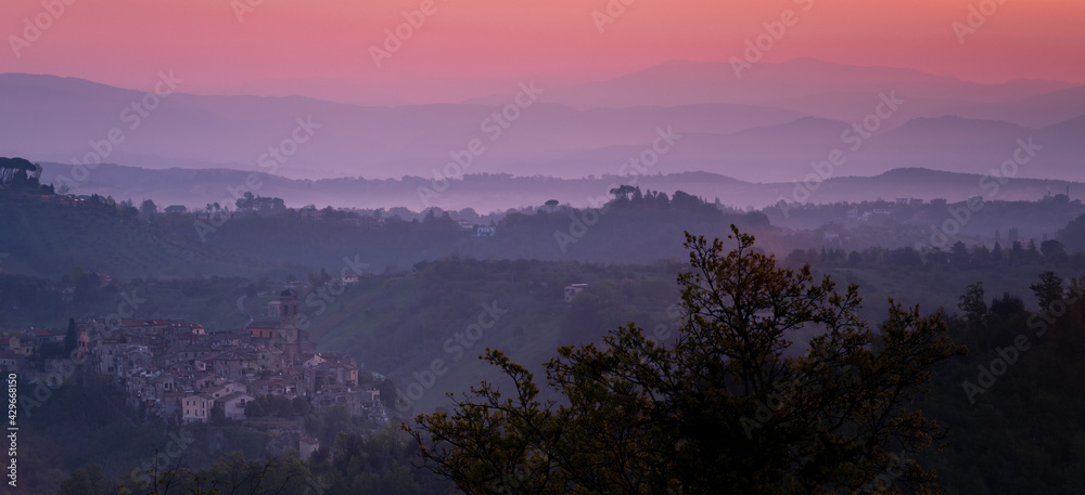 Naklejka premium Sun rising over the medieval village of Morlupo, in the Roman countryside