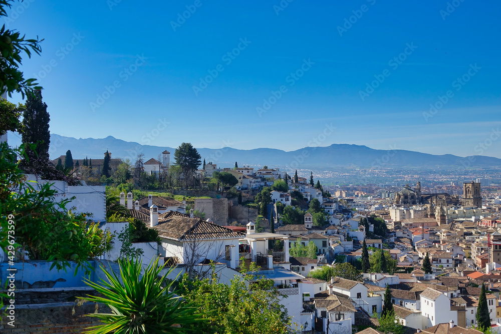View of Granada (Spain) from the San Cristobal viewpoint in the Albaycin Arab quarter one sunny morning