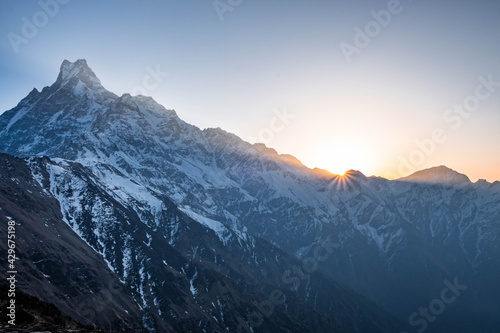 Sunrise over the Machapuchare mountain in the Himalaya Nepal. View from the Mardi Himal range in spring time. 