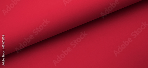 Elegant ivory red raspberry colored paper. Colorful luxurious background. Smooth pastel, shading rolled empty paper texture. Minimal design abstract, horizontal image style.