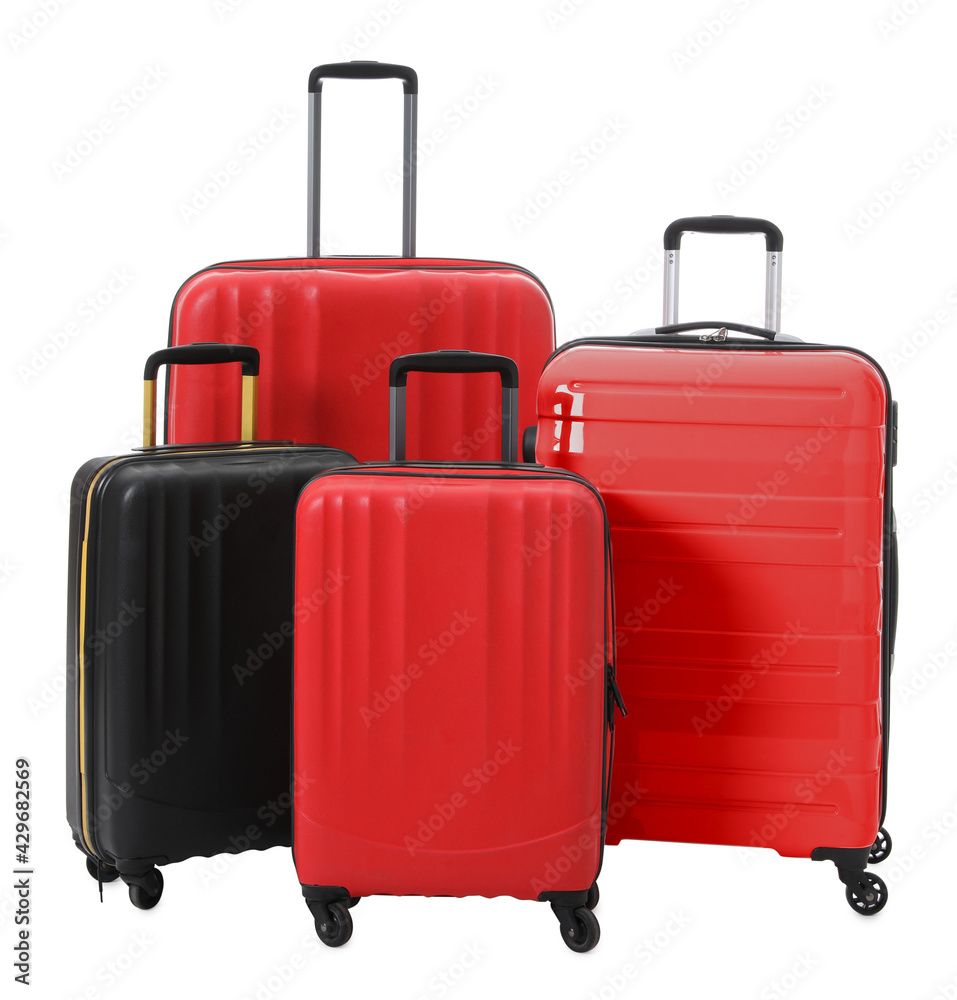 Modern suitcases for travelling on white background Modern suitcases for travelling on white background