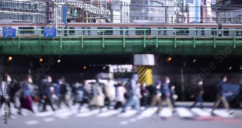 Wallpaper Mural A high speed of walking Japanese business people at urban city in Shinjuku Torontodigital.ca
