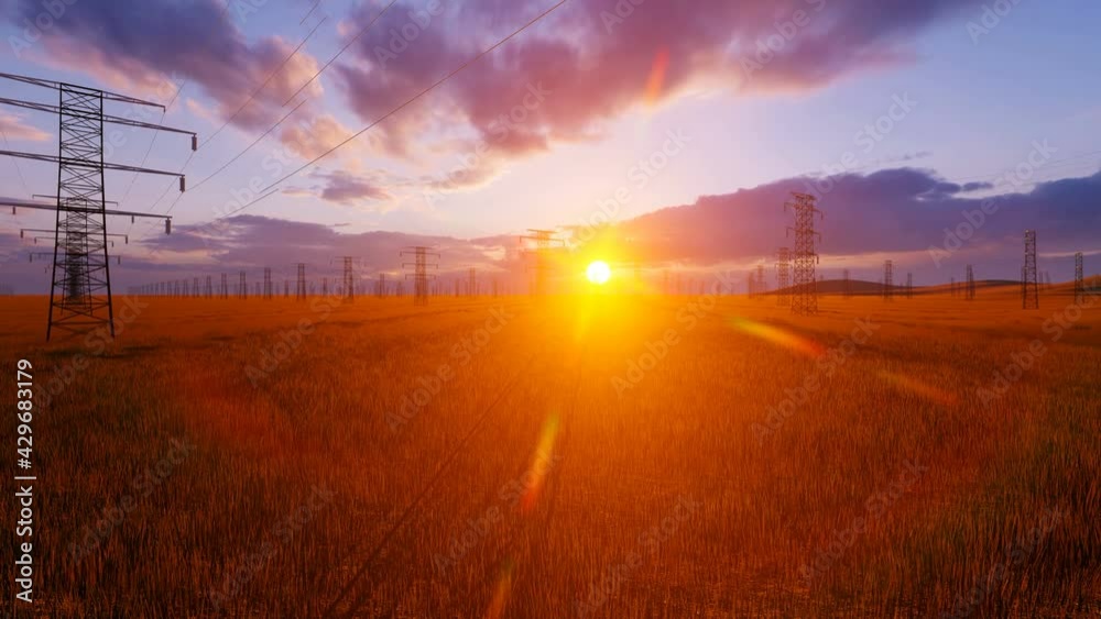 Field of electricity pillar with orange sunset Field of electricity pillar with orange sunset