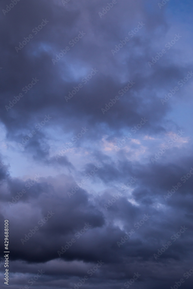 Epic Dramatic Storm sky with dark grey and black cumulus rainy clouds background texture, thunderstorm