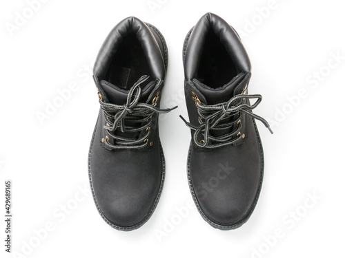 Suede boots with thick soles on a white background