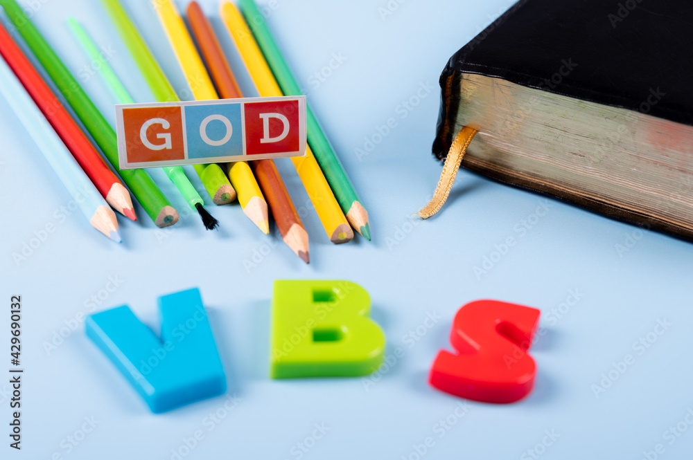 Church background with Abbreviation “VBS” (Vacation Bible School) next