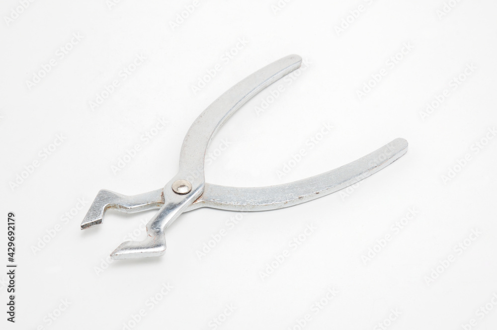 Metal sugar cutters on white background Metal sugar cutters on white background