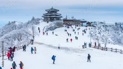 Timelapse. DEOGYUSAN,KOREA - JANUARY 10, 2021: Skier skiing on Deogyusan Ski Resort in winter,South Korea