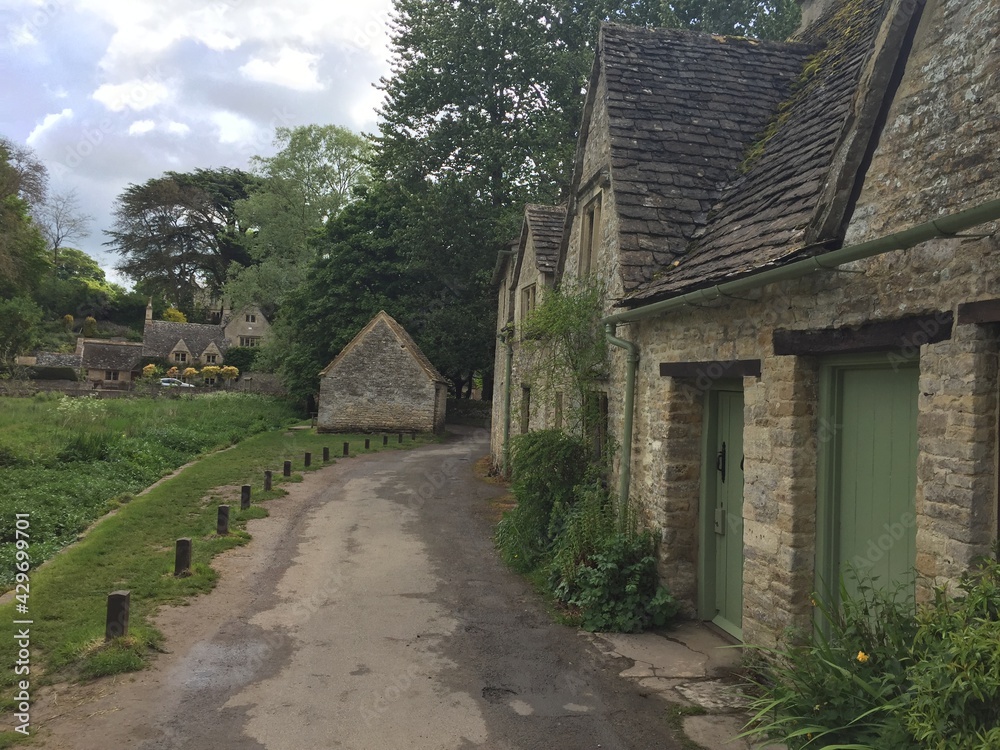 Fototapeta premium Cotswolds, Village of Bibury, the prettiest places in the world, Traditional Old England Houses,