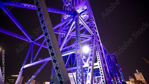 A 2-axis timelapse of cars and trucks driving across the John T. Alsop, Jr. Bridge (also known as the Main Street Bridge) during rush hour in Jacksonville, Florida. photo