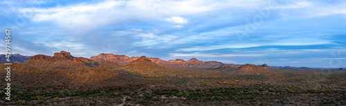 Early evening sun shining on the desert mountains © Mark