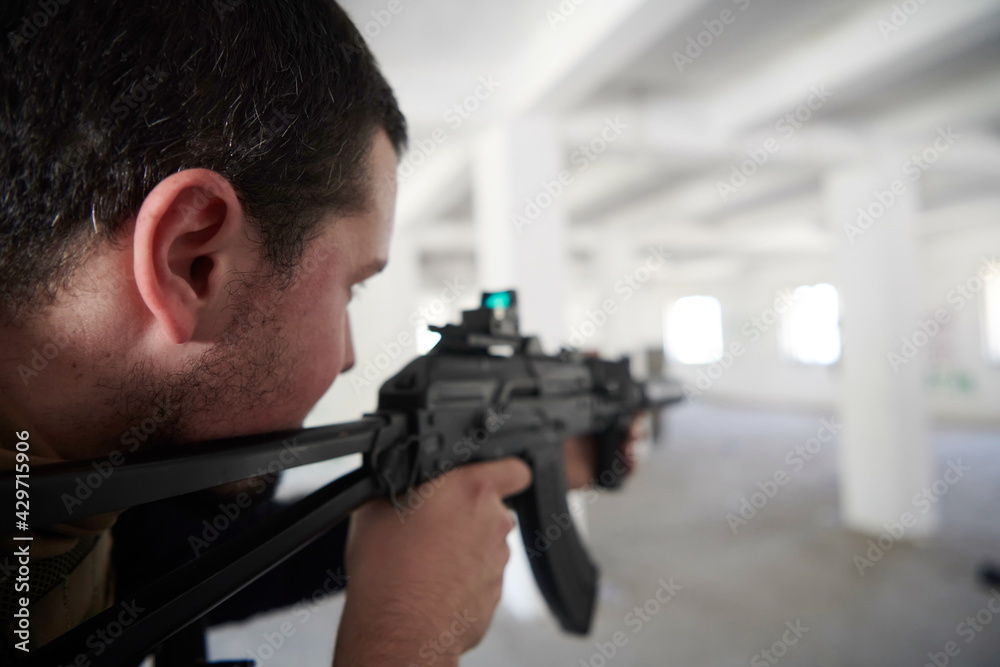 special agent soldier aiming wearing casual clothing