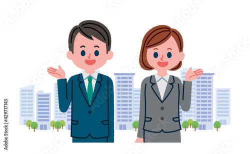 スーツを着た男女とビル群のイラスト