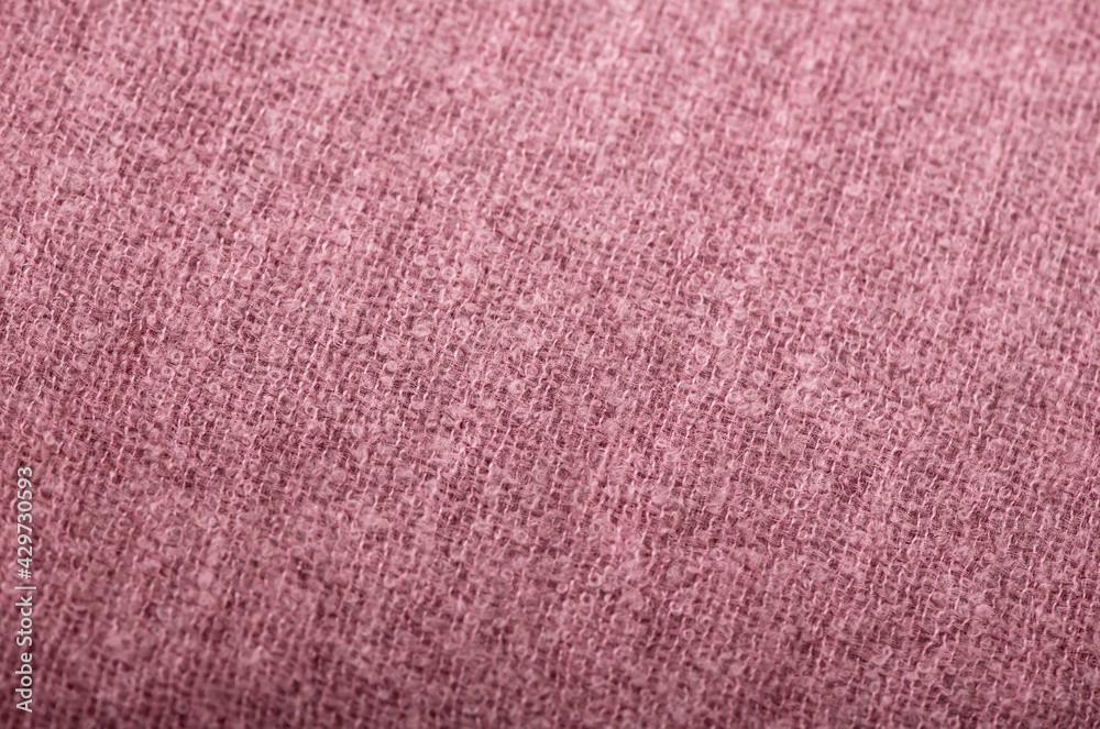 Fototapeta premium pink knitted fabric texture used as background