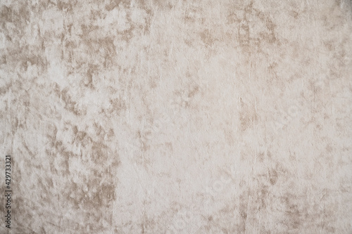 Papier peint beige de type velour