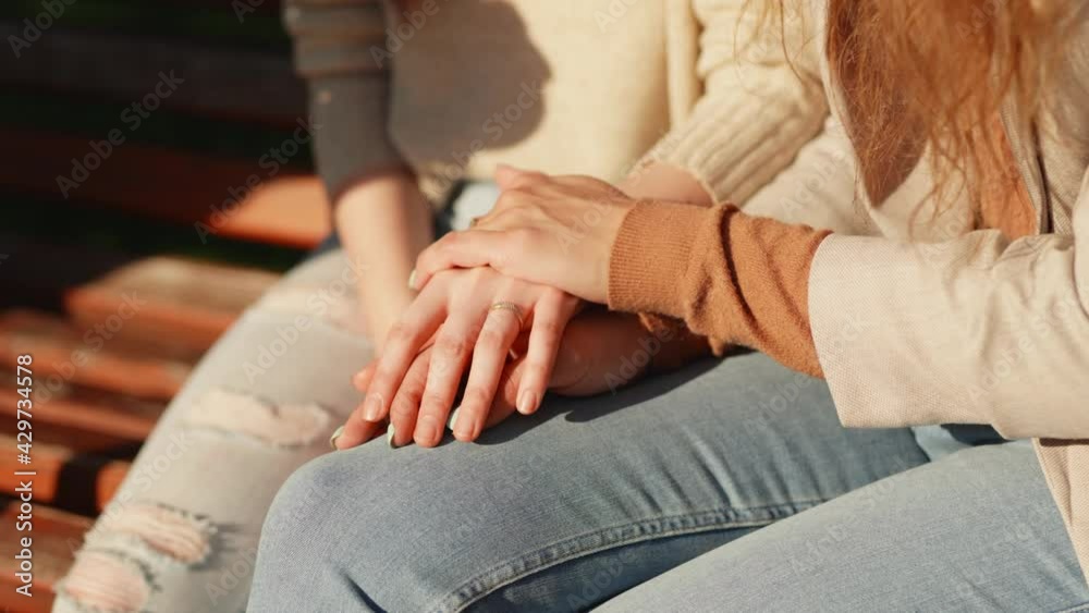 Close Up Oh Female Hands Of Two Lesbian Girls Sitting Outdoors Caring Close Up Oh Female Hands Of Two Lesbian Girls Sitting Outdoors Caring