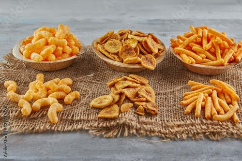 Banana chips are a healthy meal, and spiced corn puff snacks are great snack