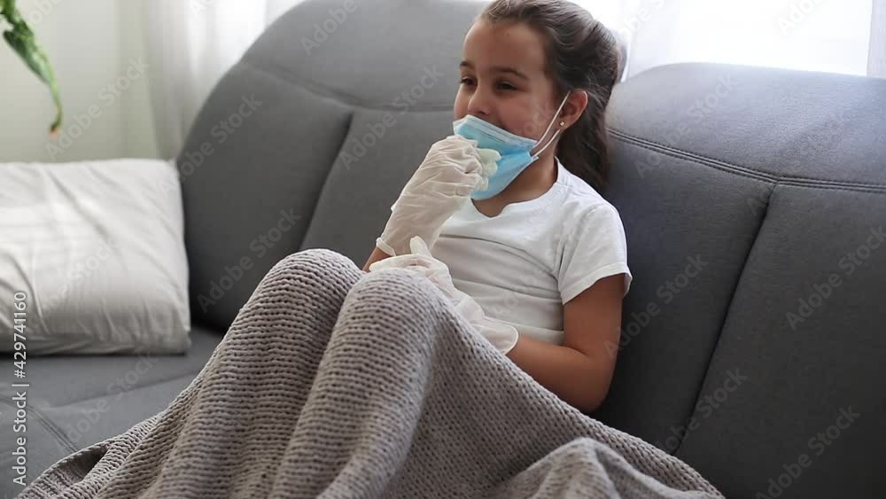 Sick child. Child in a medical mask. coronavirus covid 19 Sick child. Child in a medical mask. coronavirus covid 19