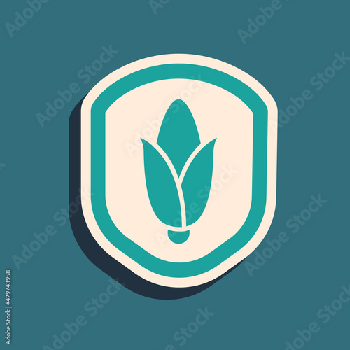Green Shield corn icon isolated on green background. Security, safety, protection, privacy concept. Long shadow style. Vector