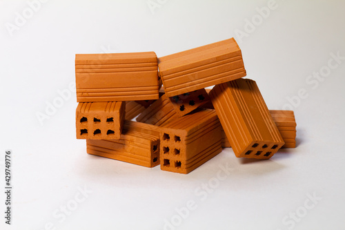 A pile of toy bricks on a white background