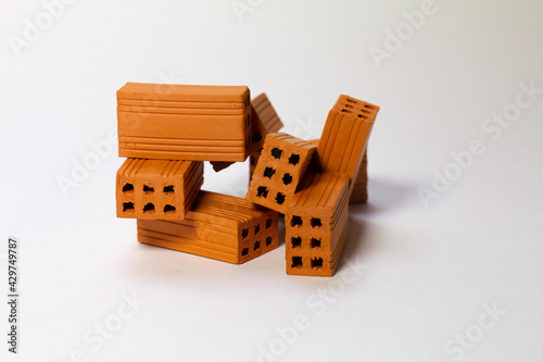 A pile of toy bricks on a white background
