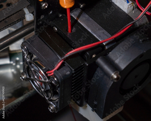 a 3d printer at work creating a custom 3d model