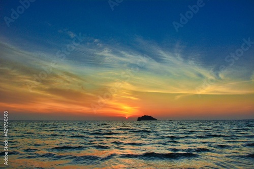 Beautiful sunset over an island, seaside