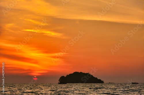 Beautiful sunset over an island  seaside