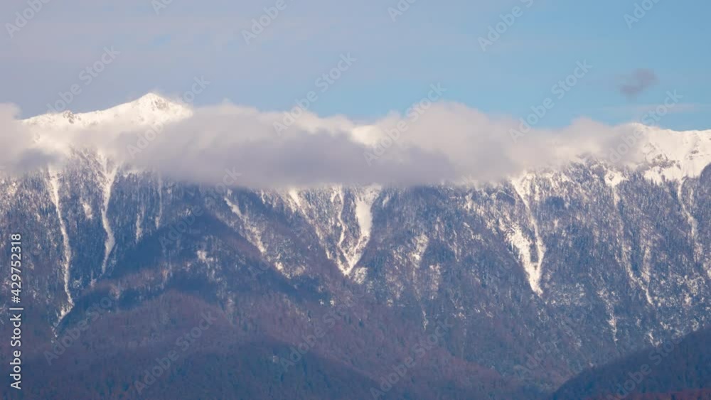 Clouds on the tops of the mountains