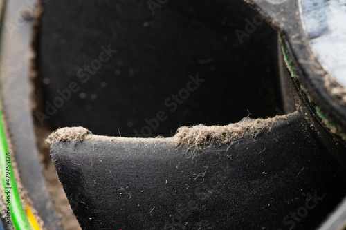 Dust and dirt on the blades of the pc cpu cooler. Close-up