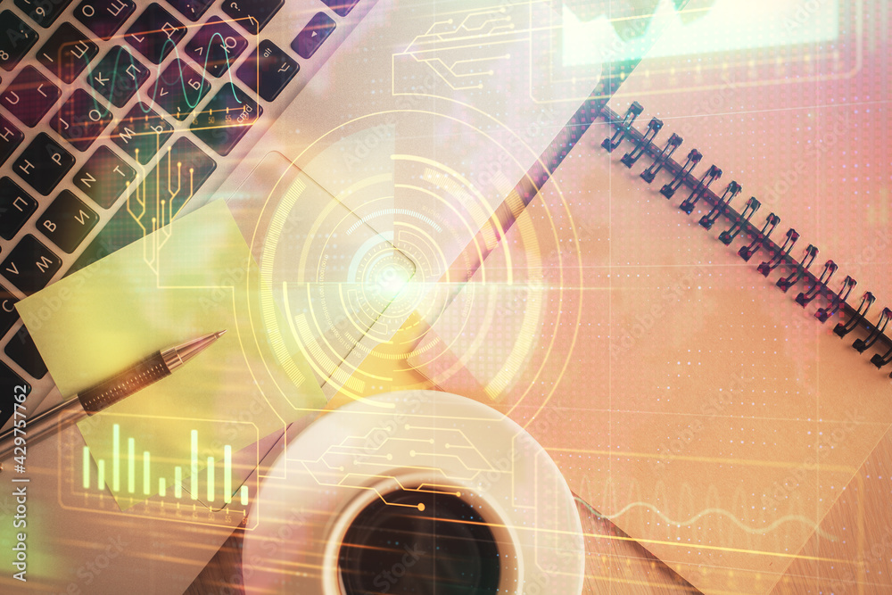 Double exposure of data theme drawing hologram over topview work table background with computer. Concept of technology. Double exposure of data theme drawing hologram over topview work table background with computer. Concept of technology.