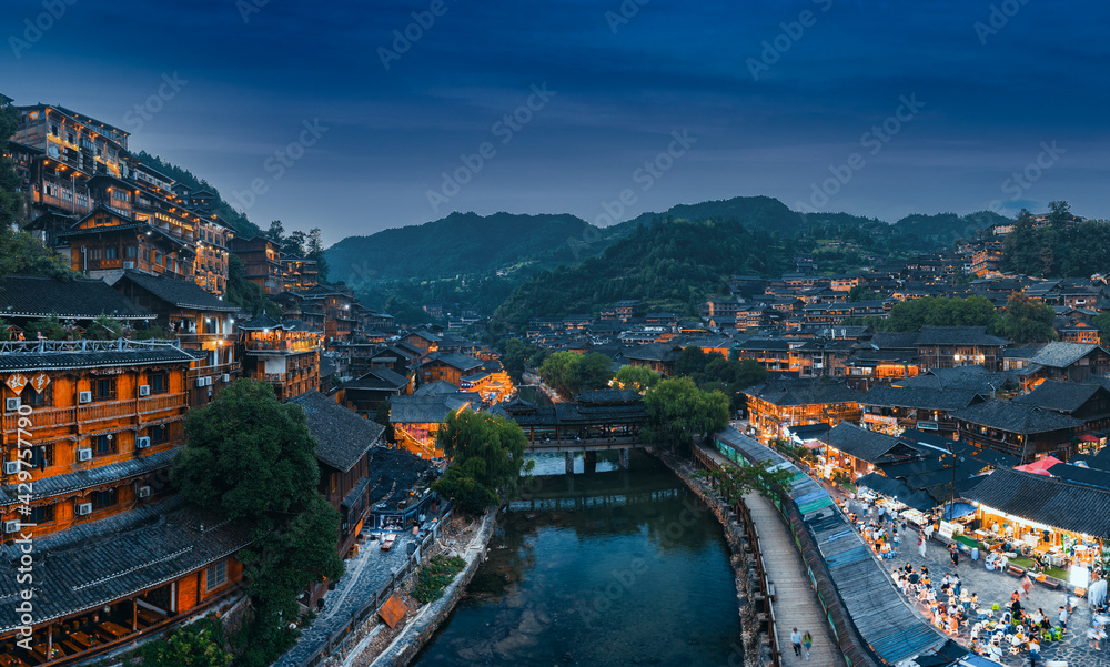 Night view of Qianhu Miao village in Xijiang, Qiandongnan, Guizhou Province, China