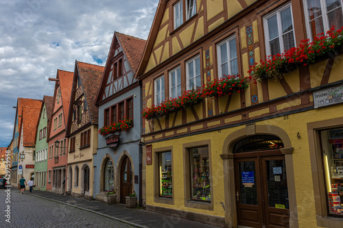 ROTHENBURG OB DER TAUBER, GERMANY, 26 JULY 2020 Colorful half-timbered houses in the street of the historic center