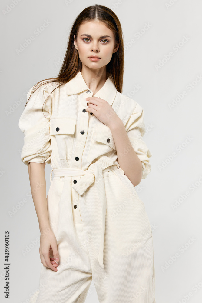 woman in stylish suit on light background gesturing with hands portrait cropped view woman in stylish suit on light background gesturing with hands portrait cropped view