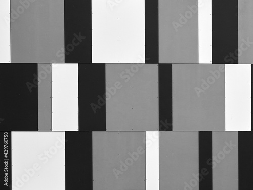 Black  gray and white fa  ade panels. Black and white texture.