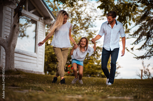 Happy family in backyard.