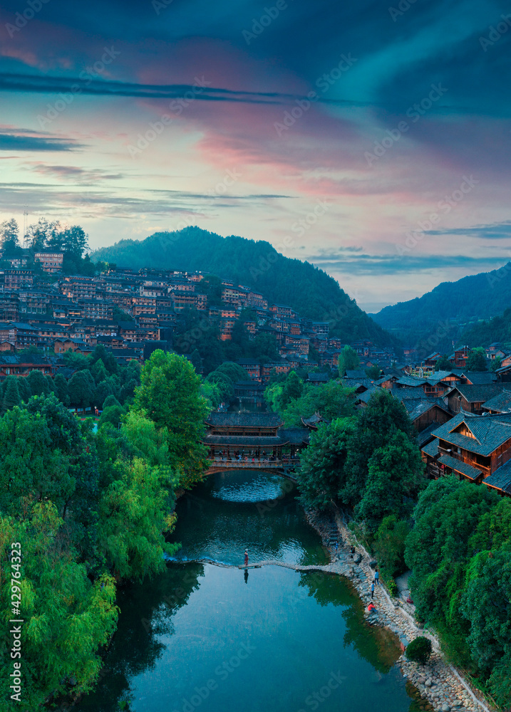 Fototapeta premium Night view of Qianhu Miao village in Xijiang, Qiandongnan, Guizhou Province, China