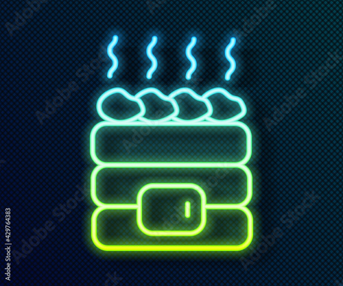 Glowing neon line Hot sauna stones icon isolated on black background. Spa resort recreation, bathhouse relaxation. Hot stones on electric heater. Vector