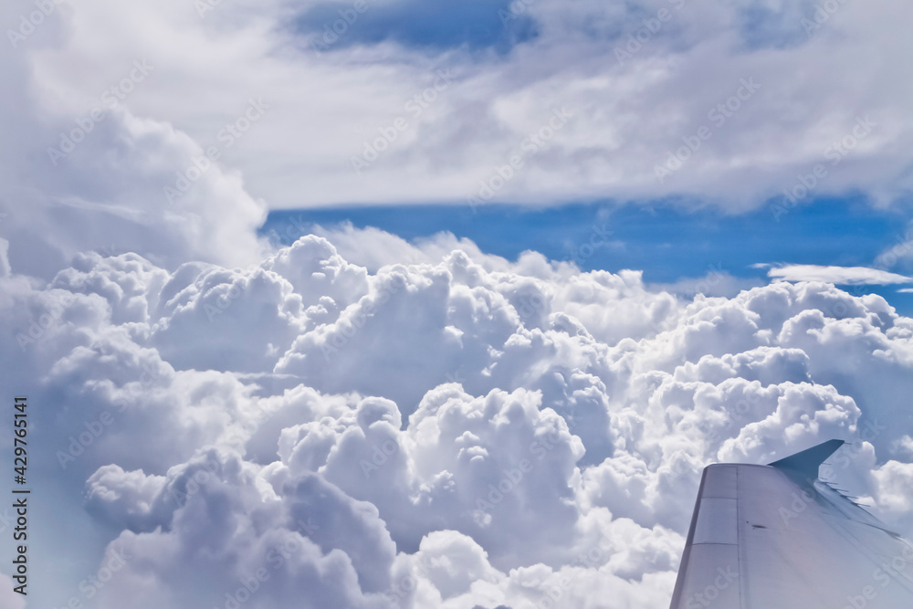 Fototapeta premium Clouds in the Sky via the Airplane